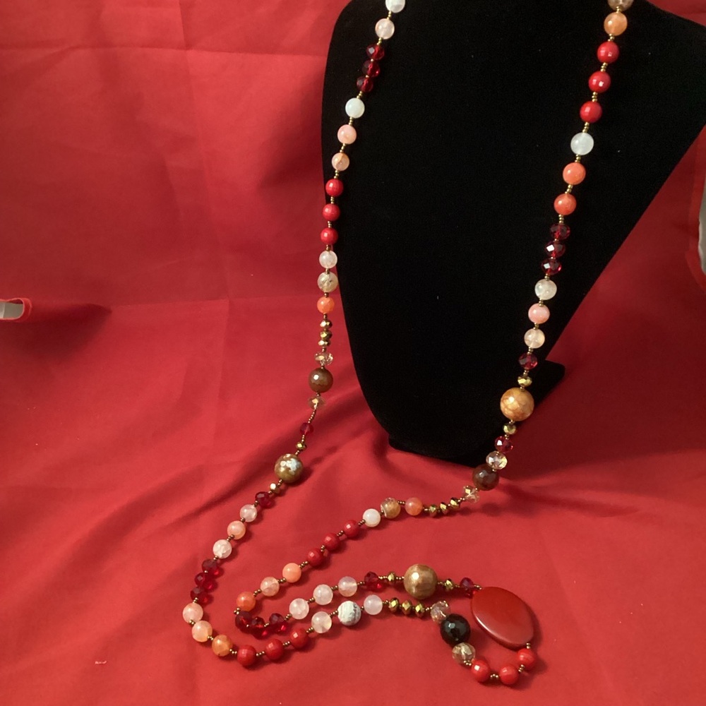 Red and gold tone mixed material long beaded necklace